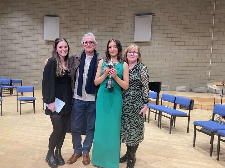 The winner, Aisling, with her proud family